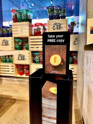 A Foodism magazine stand at Fresh City Farms