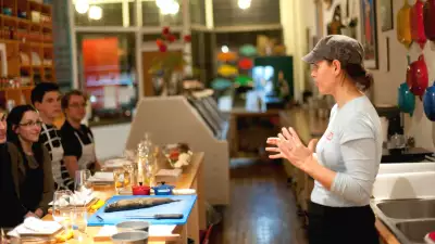 Places offering cool cooking classes in Toronto | Someone teaches a class at Hooked