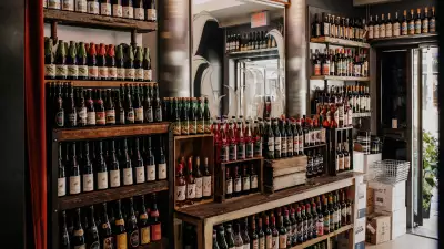 Bottega Volo | Neatly stacked wine shelves at Bottega Volo