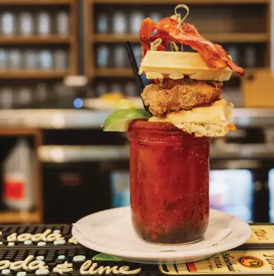 The history of the caesar cocktail | A towering, fully loaded caesar from The Beltliner The history of the caesar cocktail | A towering, fully loaded caesar from The Beltliner