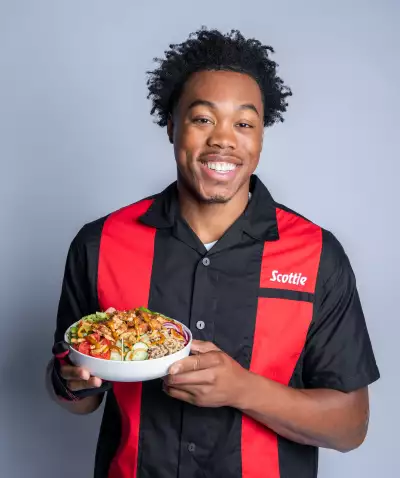 Toronto Raptor Scottie Barnes with his new Subway Jerk-Chicken Bowl
