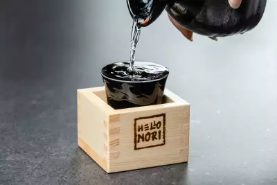 Hello Nori the Handroll Bar, Toronto | A sake pour at Hello Nori