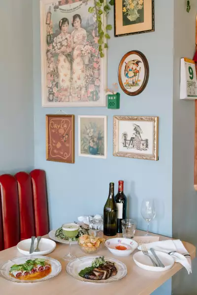 Ayla Upstairs | A corner nook and some plates at Ayla Upstairs