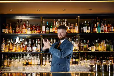 Vesper Bar Bangkok | Tom Hearn, bar manager at Bar Vesper in Bangkok, shakes up a cocktail