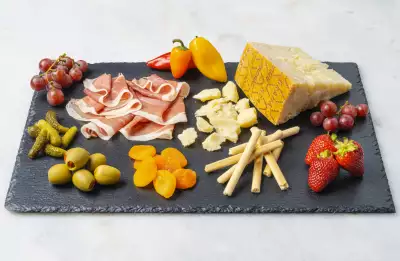 Flavours of Europe with Prosciutto di Parma PDO and Grana Padano PDO | A spread of fruit with cheese and ham from Italy