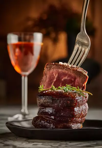 Jacobs & Co. Steakhouse | A steak with a manhattan cocktail at Jacobs & Co. Steakhouse
