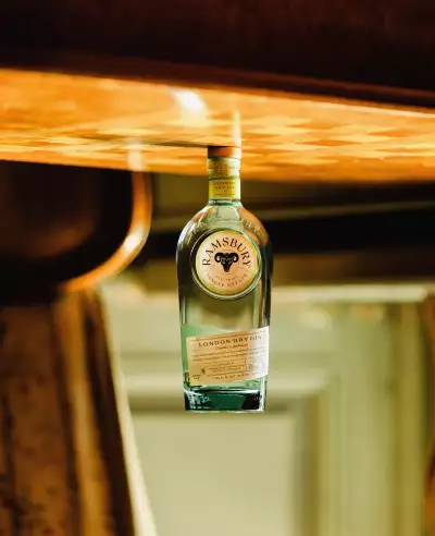 Ramsbury Gin Fall | A bottle of Ramsbury Gin on a table is shot upside down