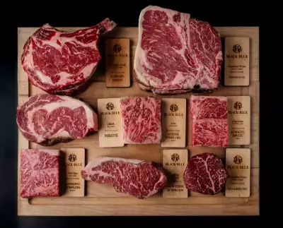 Black + Blue Steakhouse | A meat board is used to explore cuts of meat and walk diners through marbling, ageing and more