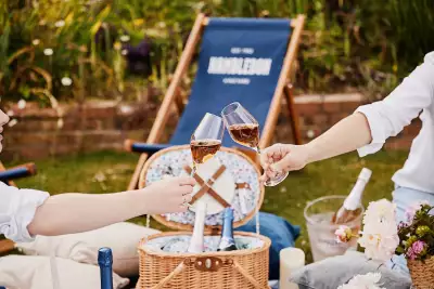 Inside England&rsquo;s evolving wine regions | A picnic and two clinking glasses at Hambleton Estate