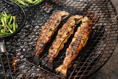 Down Home in Markdale | Fish grilling on the fire outside at Down Home