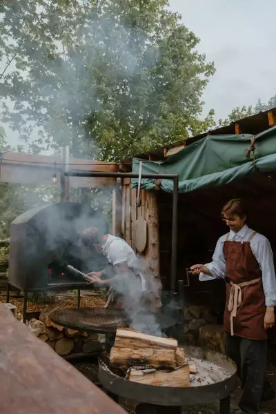 Down Home in Markdale | Co-owner Joel Gray mans the fire outside at Down Home