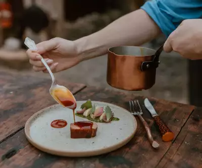 Down Home in Markdale | A plate drizzles sauce over duck at Down Home