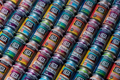 iOTA non-alcoholic beer | A colourful flat-lay of cans of iOTA non-alcoholic beer lineup from Phillips Brewing