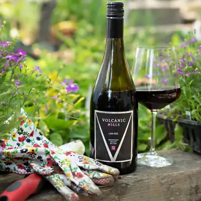 Volcanic Hills Lava Red bottle and glass