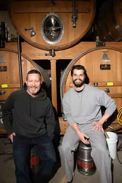 Bellwoods Jelly King | Mike Clark and Luke Pestl, co-founders of Bellwoods Brewery, pose inside in front of a beer tank