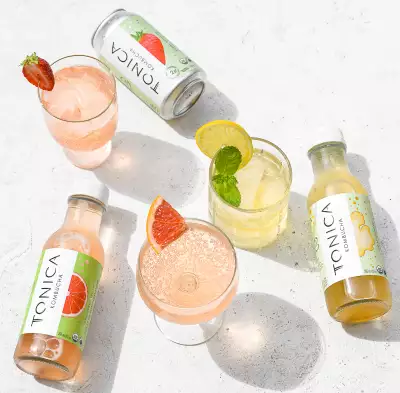 Bottles and glasses of Tonica Kombucha Bottles and glasses of Tonica Kombucha