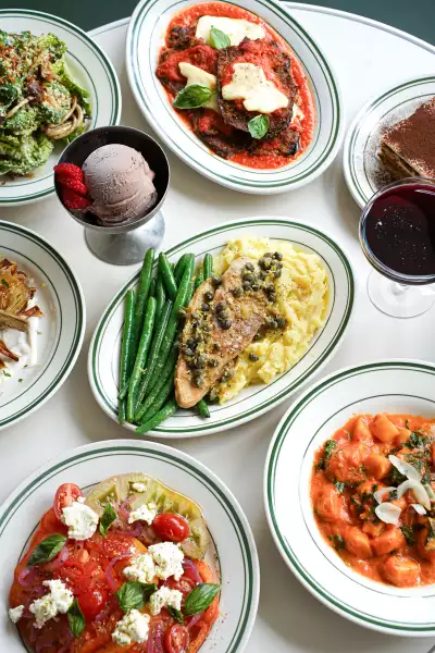 A spread of burger and fries, pasta, tiramisu and more on Stefano's Diner's summer prix fixe menu