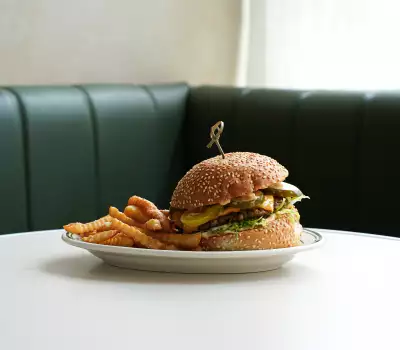 The smash burger is on the summer prixe fixe menu at Stefano's Diner The smash burger is on the summer prixe fixe menu at Stefano's Diner