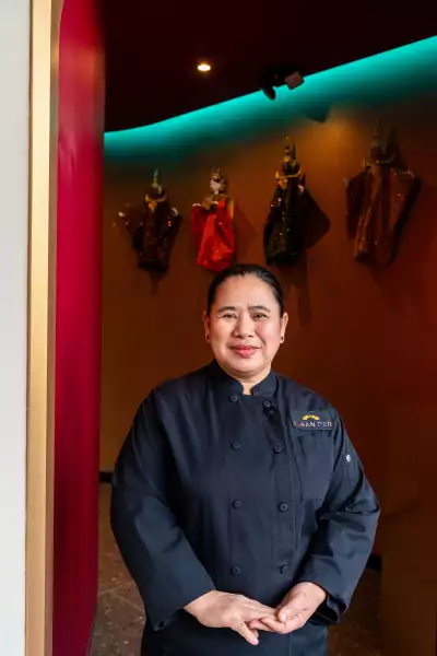 Isaan der Thai | Chef Chatsuda “Ko” Drouin poses at the entrance of Isaan der Thai