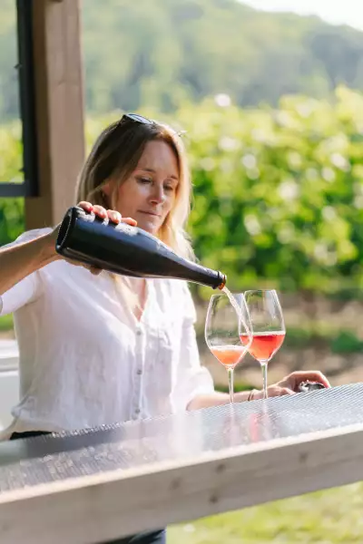 Mason Vineyard | Kelly Mason pours a glass of rosé at Mason Vineyard Mason Vineyard | Kelly Mason pours a glass of rosé at Mason Vineyard