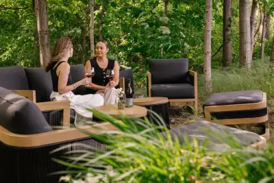 Mason Vineyard | A couple enjoy a glass of wine in the woods at Mason Vineyard Mason Vineyard | A couple enjoy a glass of wine in the woods at Mason Vineyard