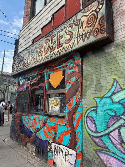 Best happy hours in Toronto | The exterior of Sneaky Dee's in Little Italy