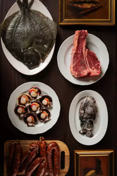 Casa Rubia | An overhead shot of turbot, scallops, rib-eye and squid