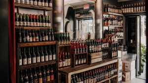 Bottega Volo | Neatly stacked wine shelves at Bottega Volo Bottega Volo | Neatly stacked wine shelves at Bottega Volo