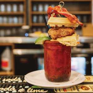 The history of the caesar cocktail | A towering, fully loaded caesar from The Beltliner The history of the caesar cocktail | A towering, fully loaded caesar from The Beltliner