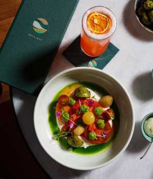 Heirloom tomato and stracciatella salad at Skylight at W Toronto hotel Heirloom tomato and stracciatella salad at Skylight at W Toronto hotel