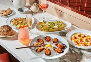 New culinary experiences in Toronto | A spread of dishes at Toronto Beach Club New culinary experiences in Toronto | A spread of dishes at Toronto Beach Club