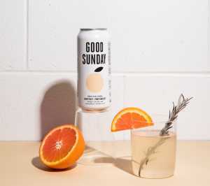 Summer drinks | A can of Good Sunday with glasses and orange wedges Summer drinks | A can of Good Sunday with glasses and orange wedges