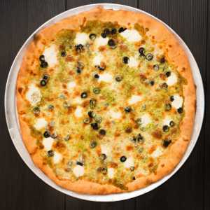 Prince Street Pizza Toronto | The Green Machine Whole pizza with nut-free pesto and olives Prince Street Pizza Toronto | The Green Machine Whole pizza with nut-free pesto and olives