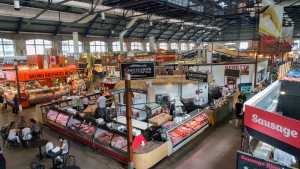 Looking down on vendors inside St. Lawrence Market in Toronto Looking down on vendors inside St. Lawrence Market in Toronto