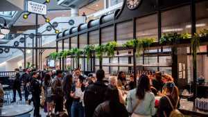 Queen's Cross Food Hall | The Crossbar, which serves coffee in the morning and cocktails from the afternoon until eve Queen's Cross Food Hall | The Crossbar, which serves coffee in the morning and cocktails from the afternoon until eve