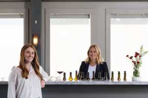 Domaine Queylus | Assistant winemaker Brooke Husband and head winemaker Kelly Masson inside Domaine Queylus's tasting room Domaine Queylus | Assistant winemaker Brooke Husband and head winemaker Kelly Masson inside Domaine Queylus's tasting room