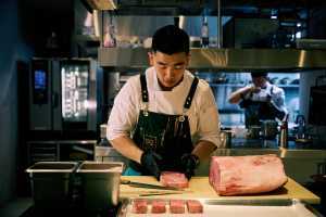 aKin Toronto | Chef Eric Chong prepares a dish at aKin aKin Toronto | Chef Eric Chong prepares a dish at aKin