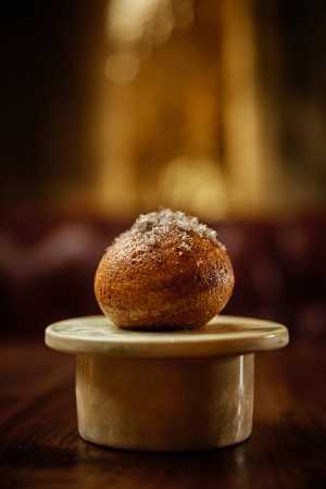 aKin Toronto | The donut is crunchy on the outside with a surprise within, is covered in truffle aKin Toronto | The donut is crunchy on the outside with a surprise within, is covered in truffle