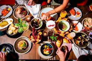 Oliver & Bonacini gift cards | An overhead shot of food and drinks at Ceci Bar