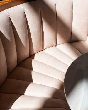 Oretta Downtown | A pink banquette at Oretta Downtown