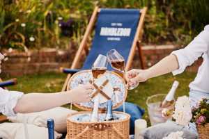 Inside England&rsquo;s evolving wine regions | A picnic and two clinking glasses at Hambleton Estate