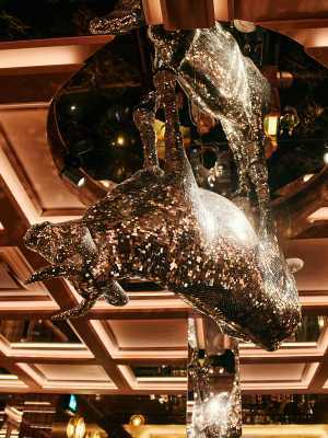 Sunday Roast at Animl Steakhouse | A sparkly cow hangs upside down from the ceiling at Animl Steakhouse