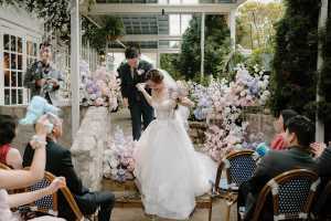 Best wedding venue restaurants in Toronto | A couple get married on Auberge du Pommier's patio Best wedding venue restaurants in Toronto | A couple get married on Auberge du Pommier's patio