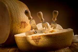 Prosciutto di Parma PDO and Grana Padano PDO cheese | Grana Padano wheel and cheese knife