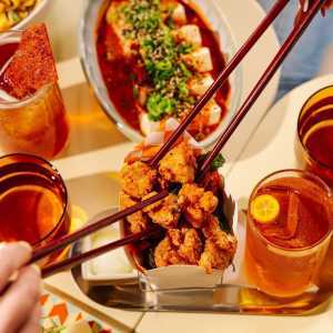 Where to watch the FIFA World Cup in Toronto | Chopsticks reach for a fried chicken bite at Simpl Things in Parkdale
