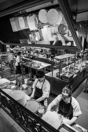 George Restaurant | A black and white overhead shot of chefs at work inside George Restaurant