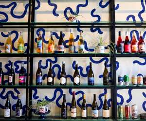 Ricky + Olivia | Shelves of all-Ontario wine at the bottle shop at Ricky + Olivia