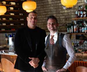 Q&A with Charlies Burgers | Charlies Burgers co-founders Donato Carozza and Franco Stalteri pose in front of a bar