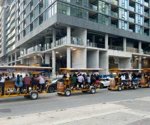 Pedal Pubs lined up on a Toronto street