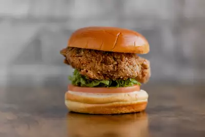 Toronto's best new restaurants for summer | Ghost Chicken's spicy and stacked sandwich
